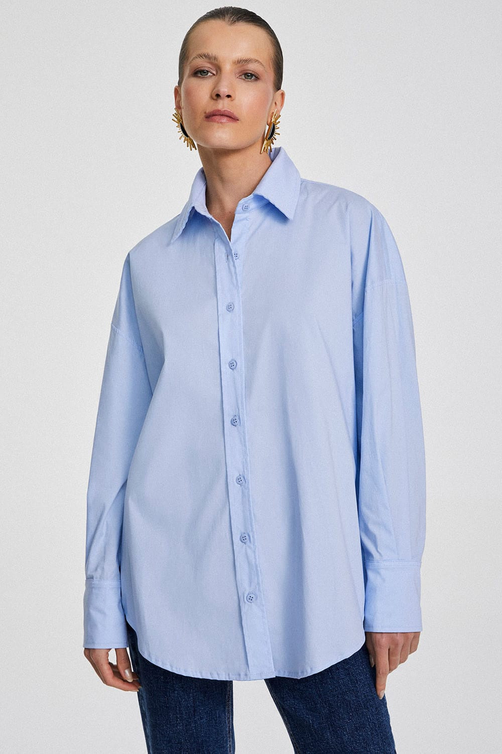 CAMISA OVERSIZED COM BARRA FRALDADA COLEÇÃO VERÃO 25